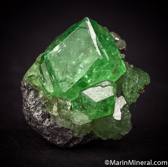 Tsavorite with Pyrite from Merelani Hills, Arusha, Tanzania [db_pics/pics/J309a.jpg]