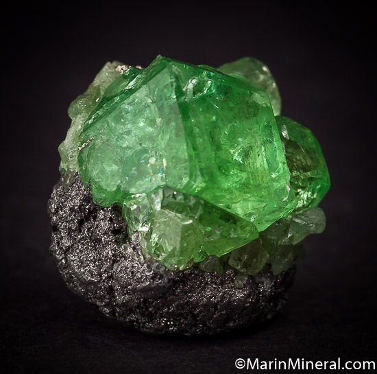 Tsavorite with Pyrite from Merelani Hills, Arusha, Tanzania [db_pics/pics/J309e.jpg]