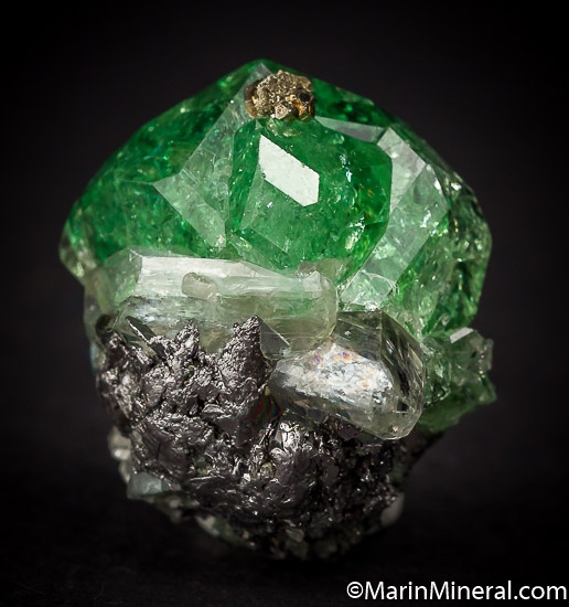 Tsavorite with Diopside, Pyrite from Merelani Hills, Arusha, Tanzania [db_pics/pics/J310a.jpg]