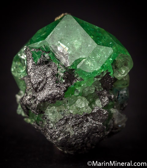 Tsavorite with Diopside, Pyrite from Merelani Hills, Arusha, Tanzania [db_pics/pics/J310b.jpg]