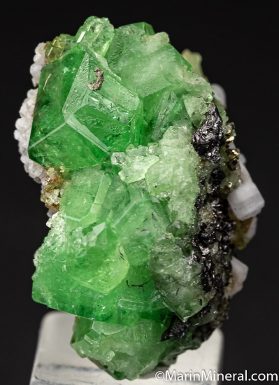 Tsavorite, Laumontite, Graphite from Merelani HIlls, Arusha, Tanzania [db_pics/pics/K714a.jpg]