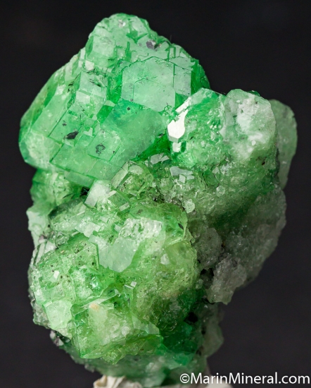 Tsavorite with Graphite from Merelani Hills, Arusha, Tanzania [db_pics/pics/M419c.jpg]