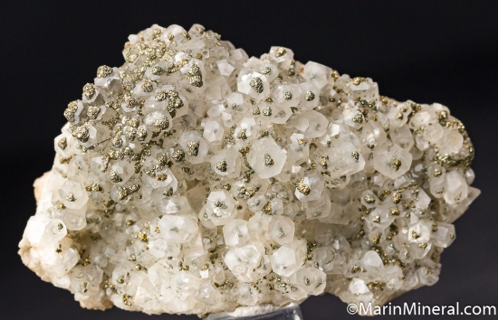 Pyrite on/in Calcite from St. Andreasberg, Harz, Lower Saxony, Germany [db_pics/pics/M675a.jpg]