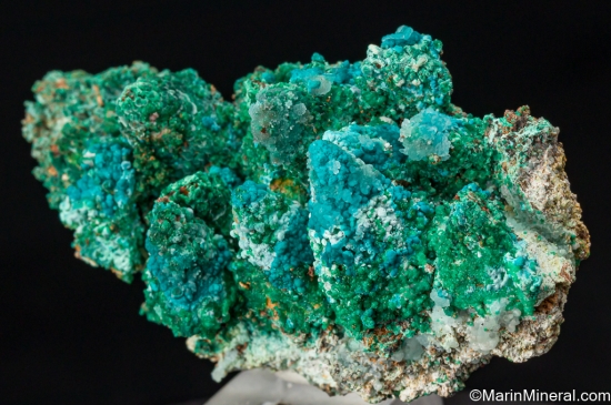 Cuprian Adamite, Rosasite, Smithsonite, Malachite on Calcite casts from Christiana Mine, Laurion, Attica, Greece [db_pics/pics/ST936b.jpg]