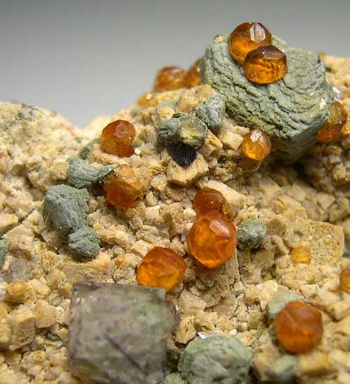 Fluorite, Spessartine, Mica on Orthoclase from Tongbei, Fujian Prov., China [db_pics/pics/a659b.jpg]