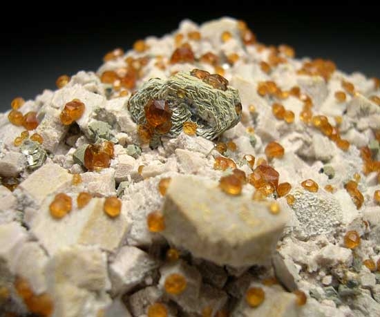 Fluorite, Spessartine, Mica on Orthoclase from Tongbei, Fujian Prov., China [db_pics/pics/a661c.jpg]