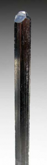 Calcite on Stibnite from Henan Prov., China [db_pics/pics/a675b.jpg]