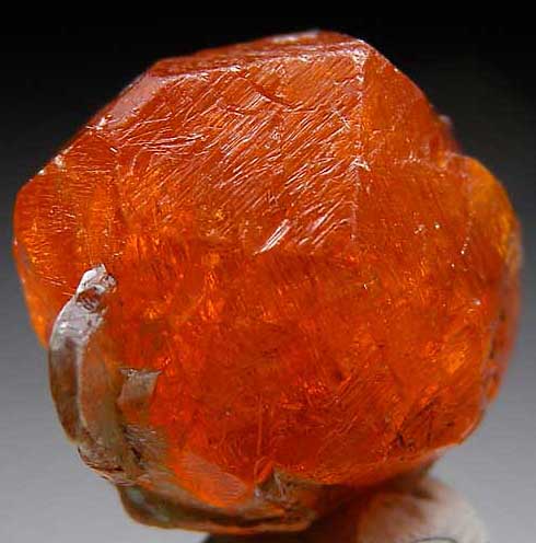 Spessartine with Mica from Loliondo, Arusha Region, Tanzania [db_pics/pics/af405a.jpg]