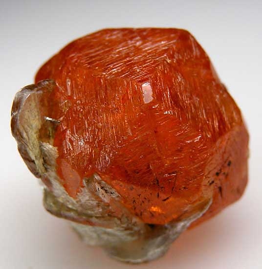 Spessartine with Mica from Loliondo, Arusha Region, Tanzania [db_pics/pics/af405b.jpg]