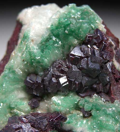 Cuprite with Malachite included Calcite from Tsumeb, Namibia [db_pics/pics/af475b.jpg]