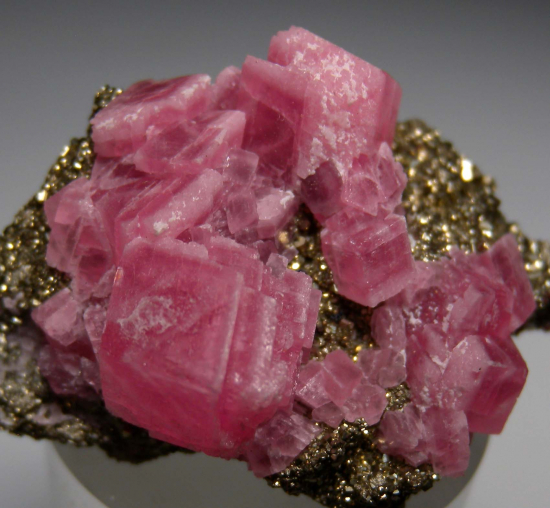 Rhodochrosite on Pyrite from Santa Rita Mine, Morococha District, Yauli Province, Junín, Peru [db_pics/pics/p443d.jpg]