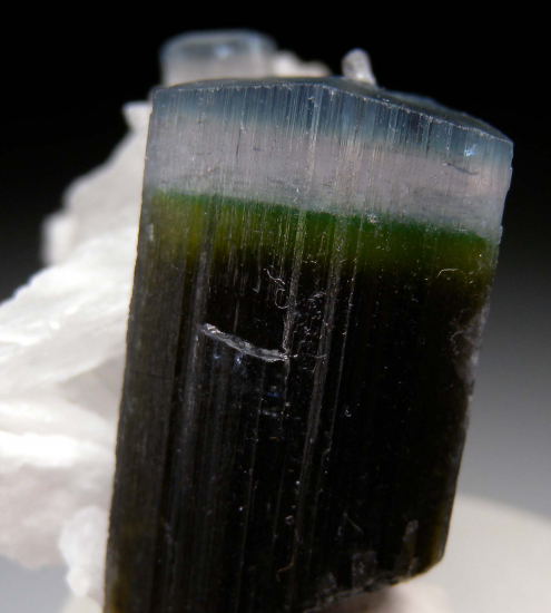 Hambergite on Tourmaline from Stak Nala, Skardu Dist., Pakistan [db_pics/pics/p594c.jpg]