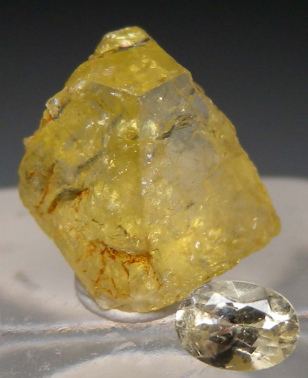 Rhodizite rough and cut set from Ampasogona pegmatite, Andrembesoa, Betafo Dist., Madagascar [db_pics/pics/r443a.jpg]